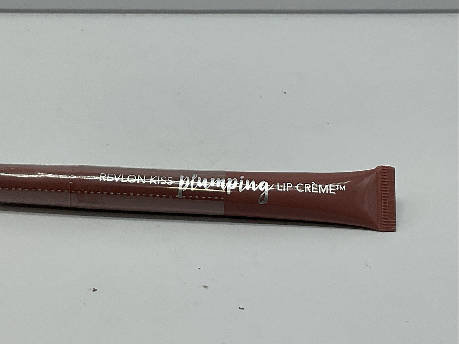 REVLON KISS PLUMPING LIP CREME 525 BARELY BLUSH