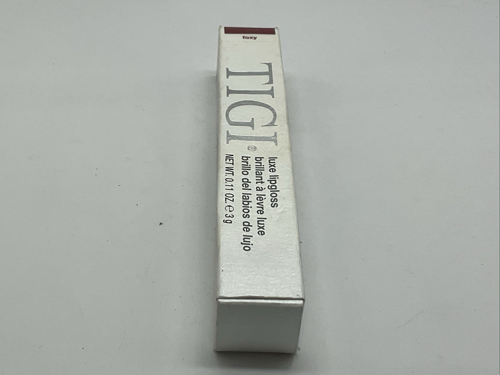 TIGI Professional Cosmetics Luxe Lip Gloss 0.11oz - Foxy